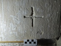 Cross by south door, interior
