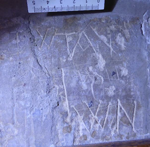 Initials on the north side of the entrance archway