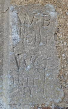 Initials on the chancel window