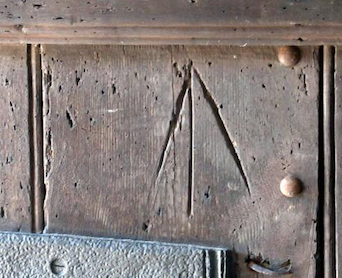 Arrow on the church door