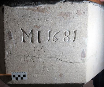 Initial on the south-west face of the font