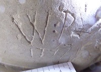 Initials & date on tomb