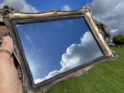 A reflection of a skyscape